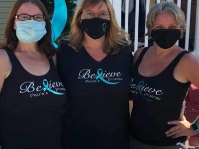 Picture of Paula S. Cousins and two associates from event